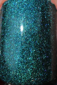 A England Saint George St George and the dragon green blue teal holo holographic nail polish multicoloured rainbow effect forest green sea UK Indie brand Adina close up